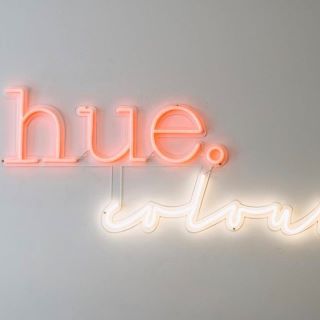 Custom Neon® red & white logo @hue.colour