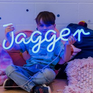 Custom Neon® name sign on clear backboard