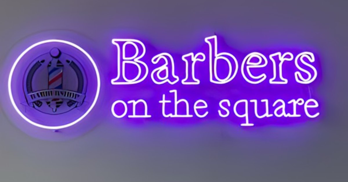 Purple barbershop logo sign by Custom Neon® for @barbers.onthesquare-landscape