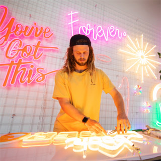 Custom Neon™ designer Harry creating a handmade sign
