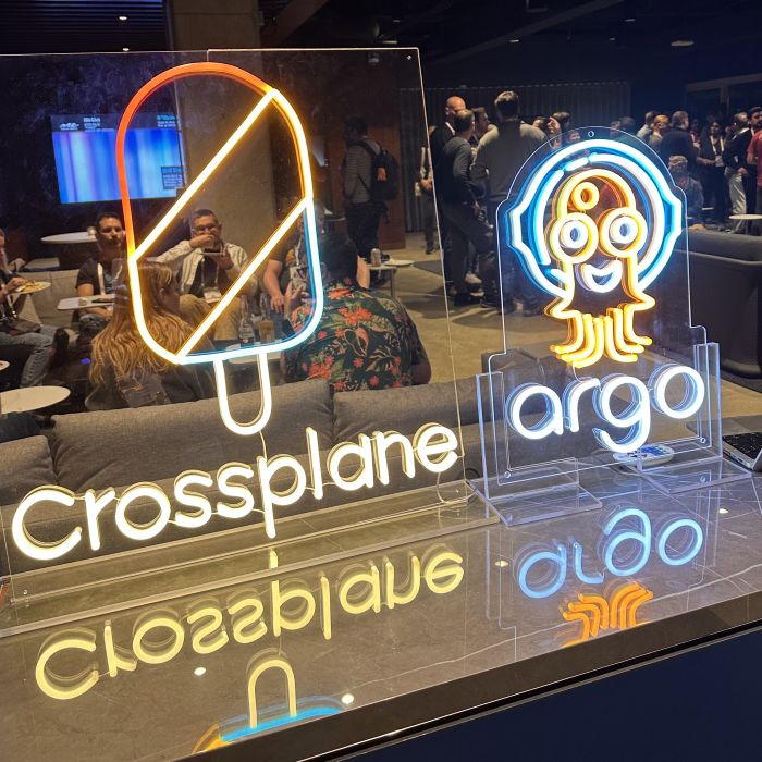 Custom Neon® freestanding trade show signs with a stand