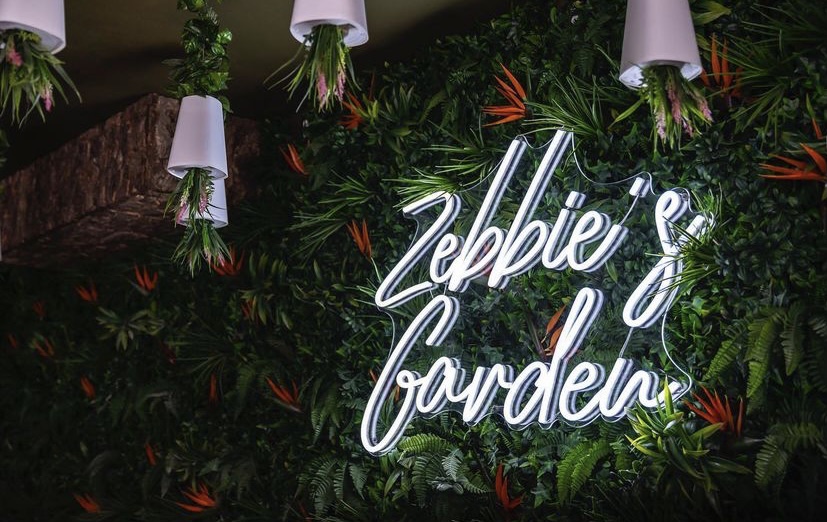 White Custom Neon® bar name sign @zebbiesgarden
