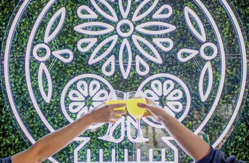 Grass wall with Custom Neon® sugar skull @delsurtacqueria