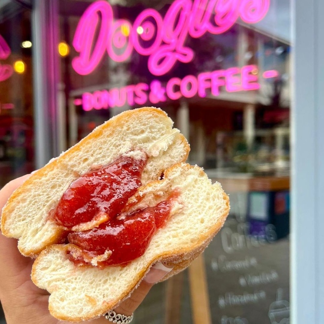 Pink Custom Neon® bakery logo sign @dooglesdonuts