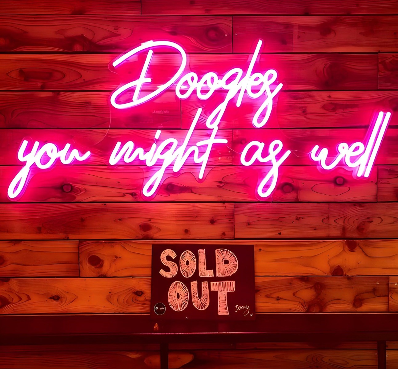 Custom Neon® pink tagline sign @dooglesdonuts