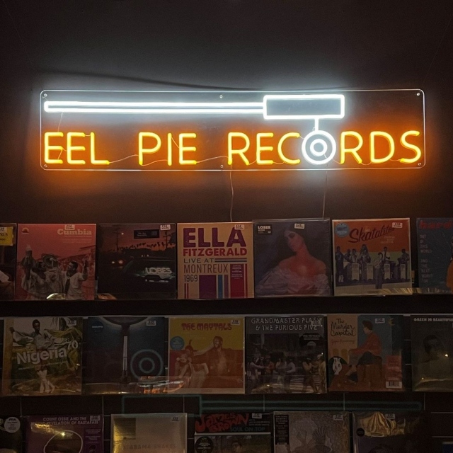 Retail store logo sign by Custom Neon® @eelpierecords