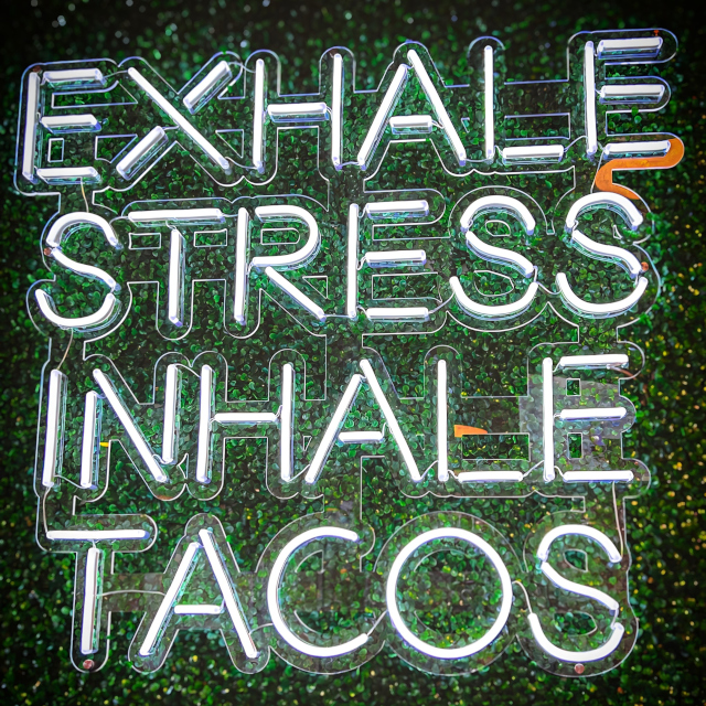 Exhale Stress Inhale Tacos Custom Neon® food quote sign @lacara_yxy photo@joshualauerphotography