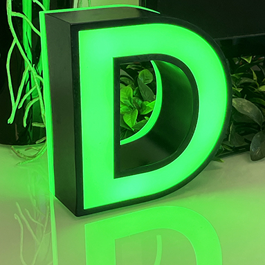 Front and back lit channel letter D with white back light and lime green face light