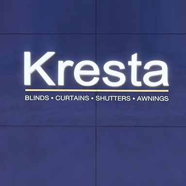 White Front & Back Lit sign on blue tiled wall