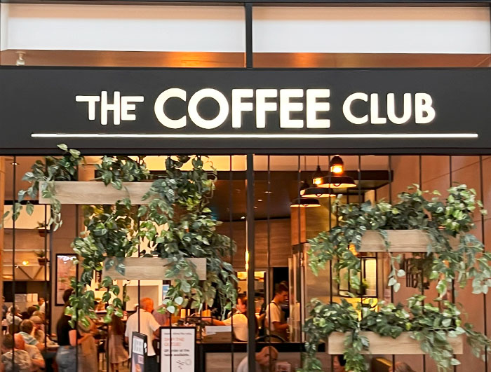 The Coffee Club white front lit sign