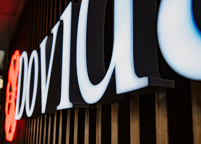 Front lit interior sign with logo