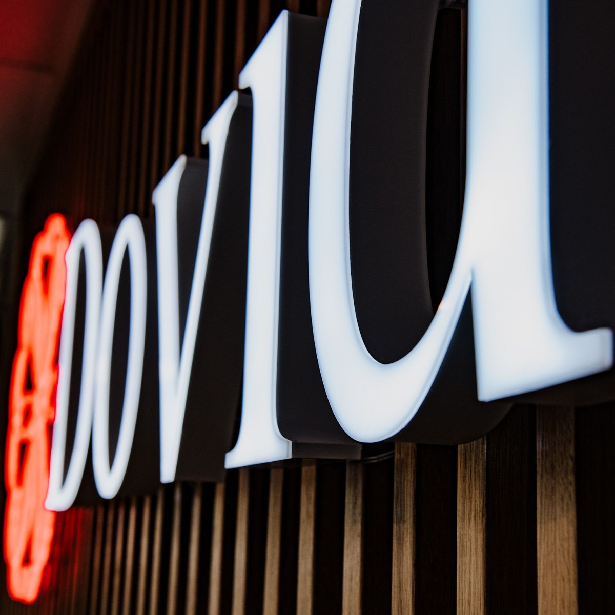 Frontlit LED office sign with a white face and powder coated metal sides