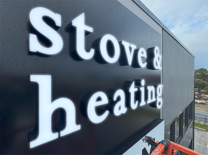 Close up photograph of front lit sign