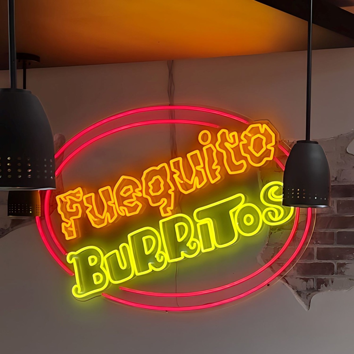 Custom Neon® red orange and yellow analogous coloured sign made for @fuegutioburritos