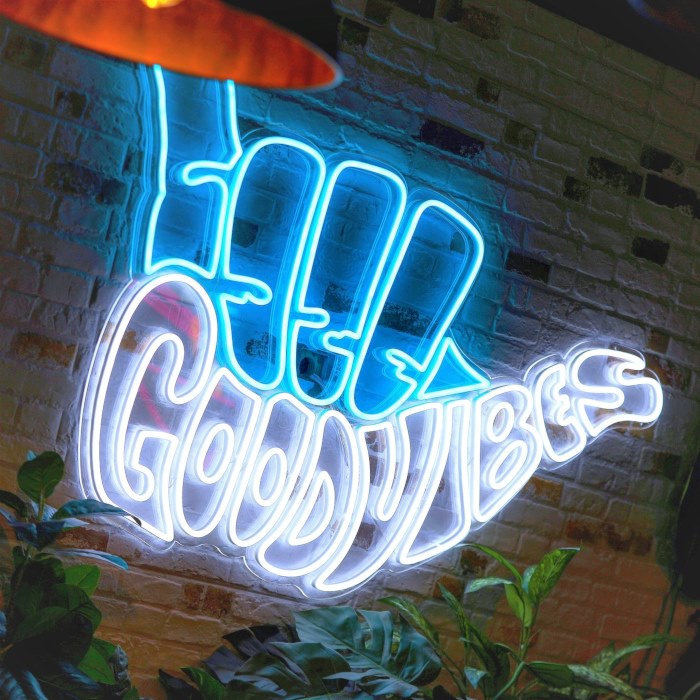 Yellow branded tagline sign @mktplce.uk made by Custom Neon® photography @brianfbenton