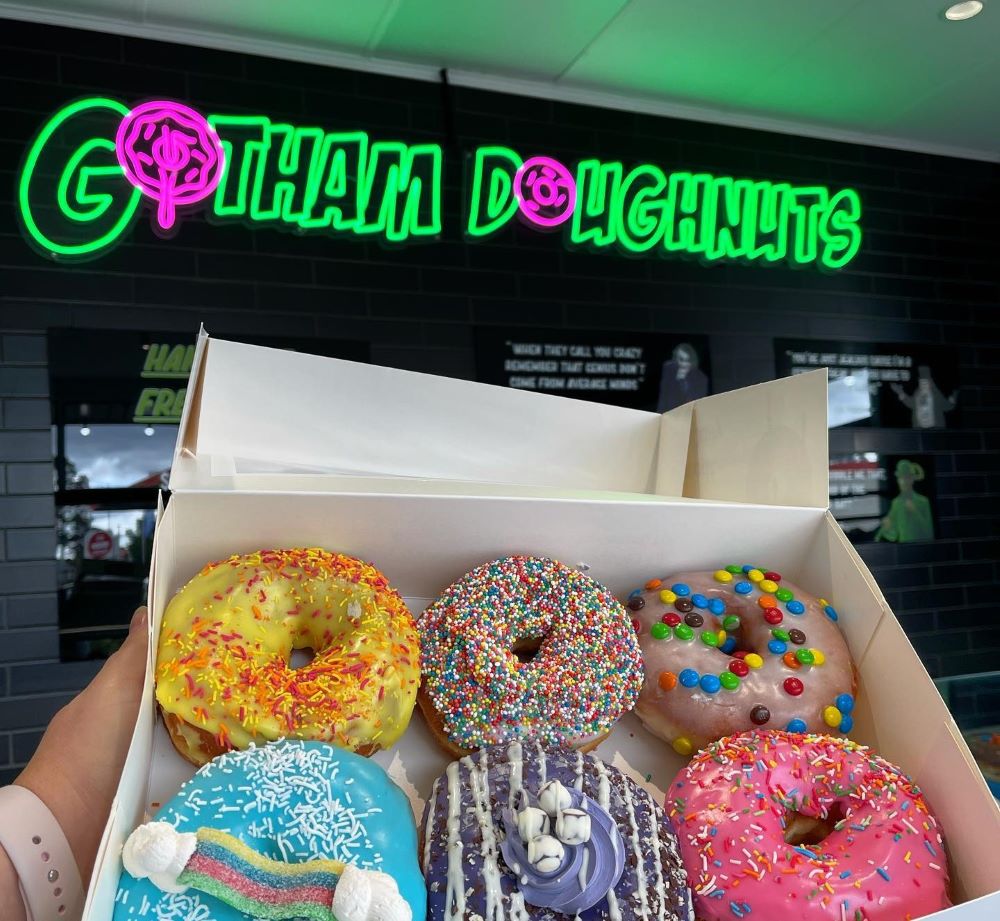 Custom Neon® green & pink donut shop sign @gotham.doughnuts