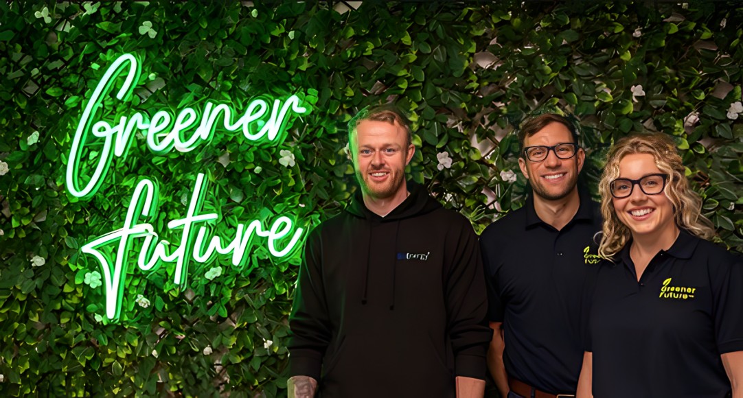 Custom Neon® green business name sign on greenery wall @greenerfuturesolar