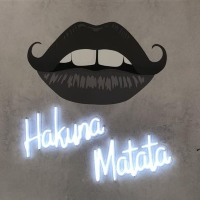 Hakuna Matata white Custom Neon® sign from Disney's Lion King @aesthetik_dental