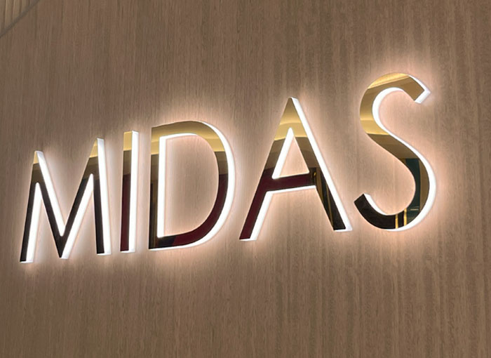 Gold mirrored backlit retail sign