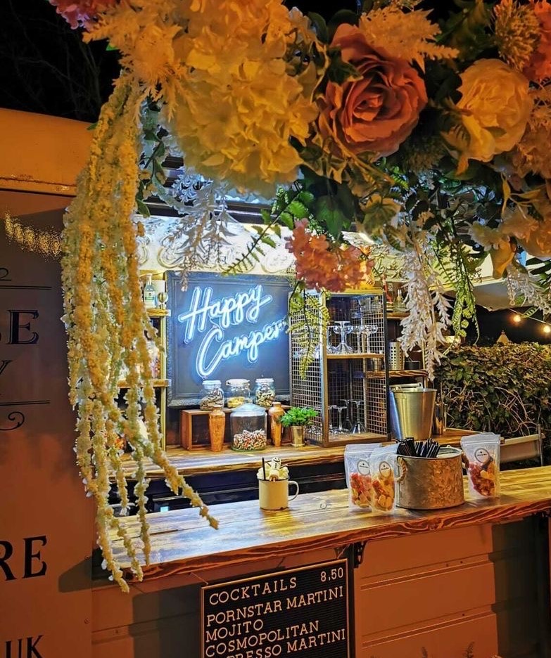 White Custom Neon® Happy Camper sign in mobile coffee van @bakehousecoffeeshop