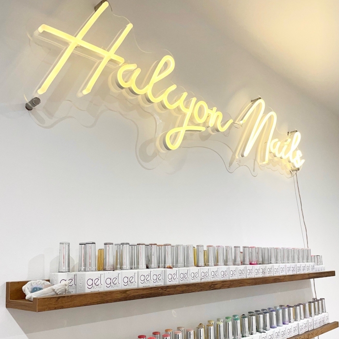 Warm white Custom Neon® nail salon name sign @halcyonnails