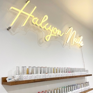 Warm white Custom Neon® nail salon name sign @halcyonnails