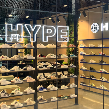 Custom Neon® shopfront sign hung from the ceiling @hypedc