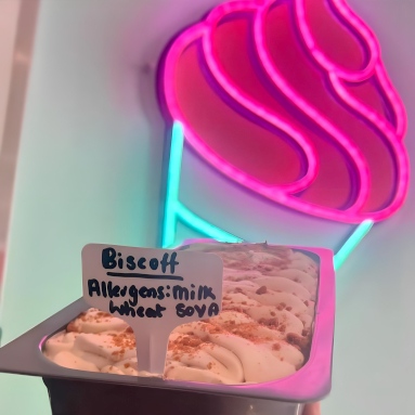 @gingersicecreamparlour pink and mint LED neon ice cream cone made by Custom Neon® with a tray of ice cream in the foreground