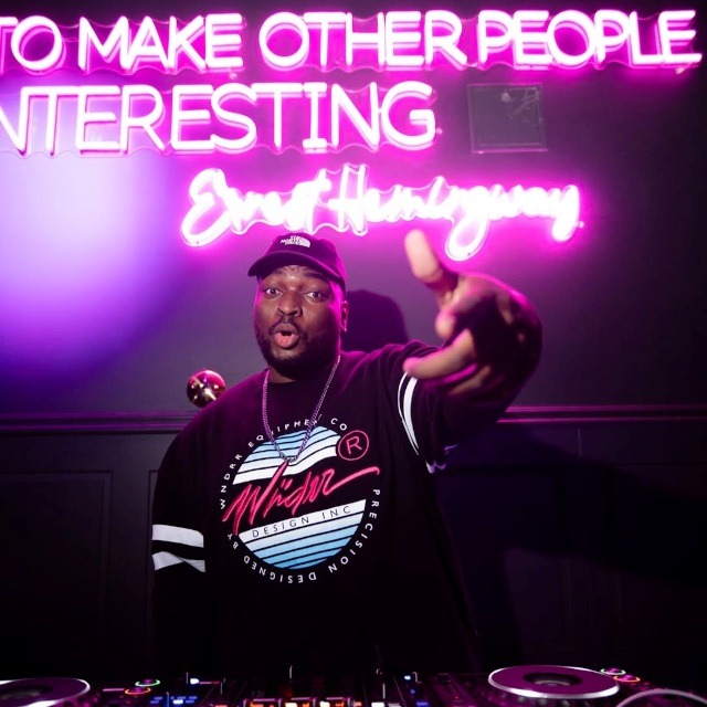 Large pink Ernest Hemmingway quote sign I drink to make other people more interesting made by Custom Neon® @whiskytangobar