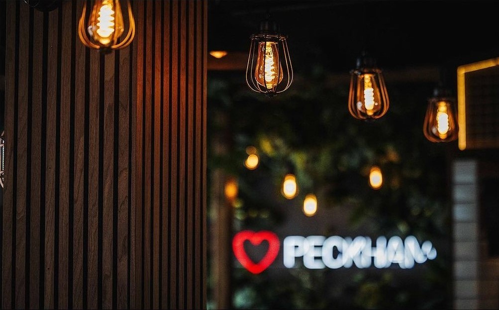 I Love Peckham Custom Neon® sign on lush plant wall @mktplce.uk