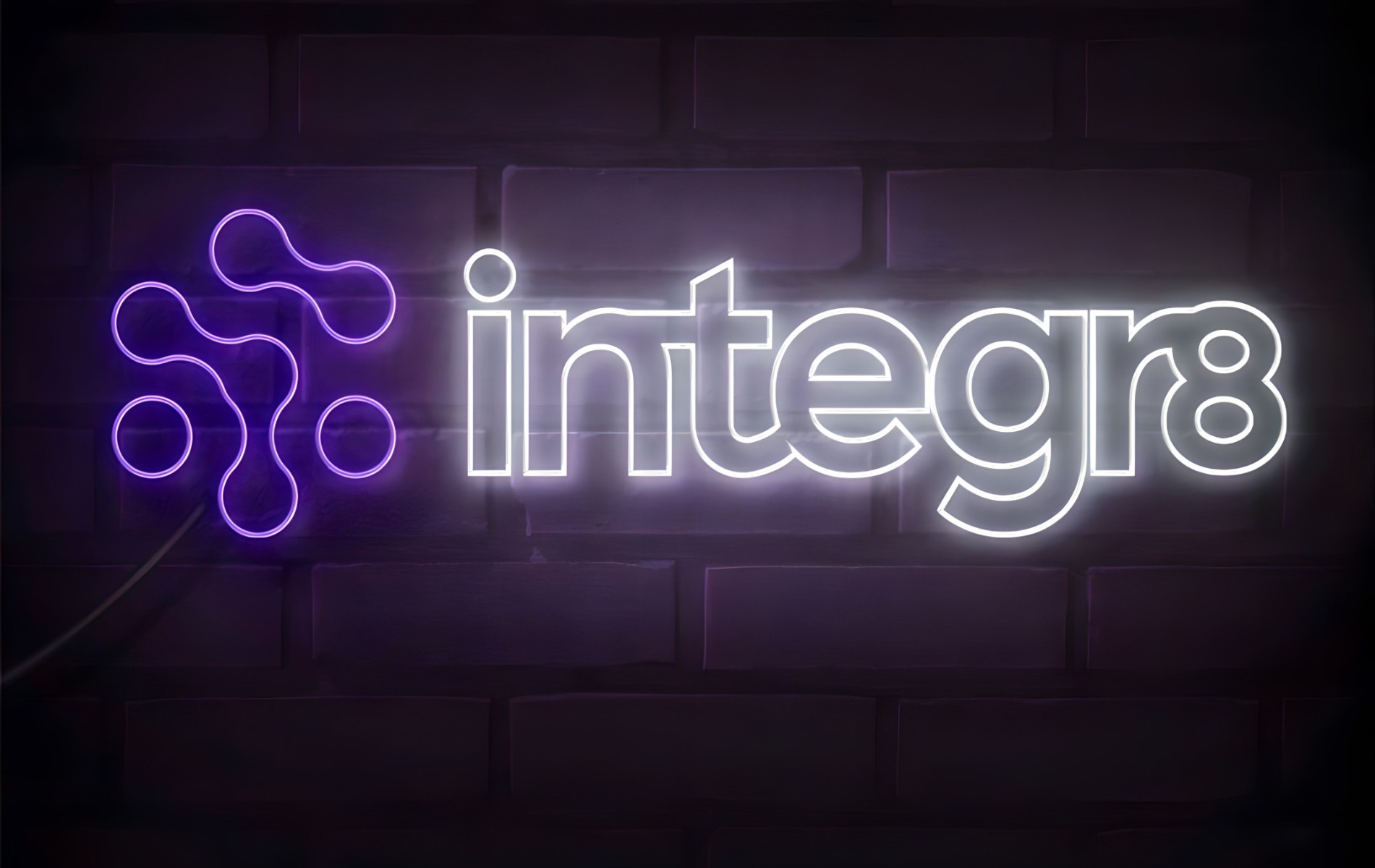 @integr8.it purple and white logo sign by Custom Neon®
