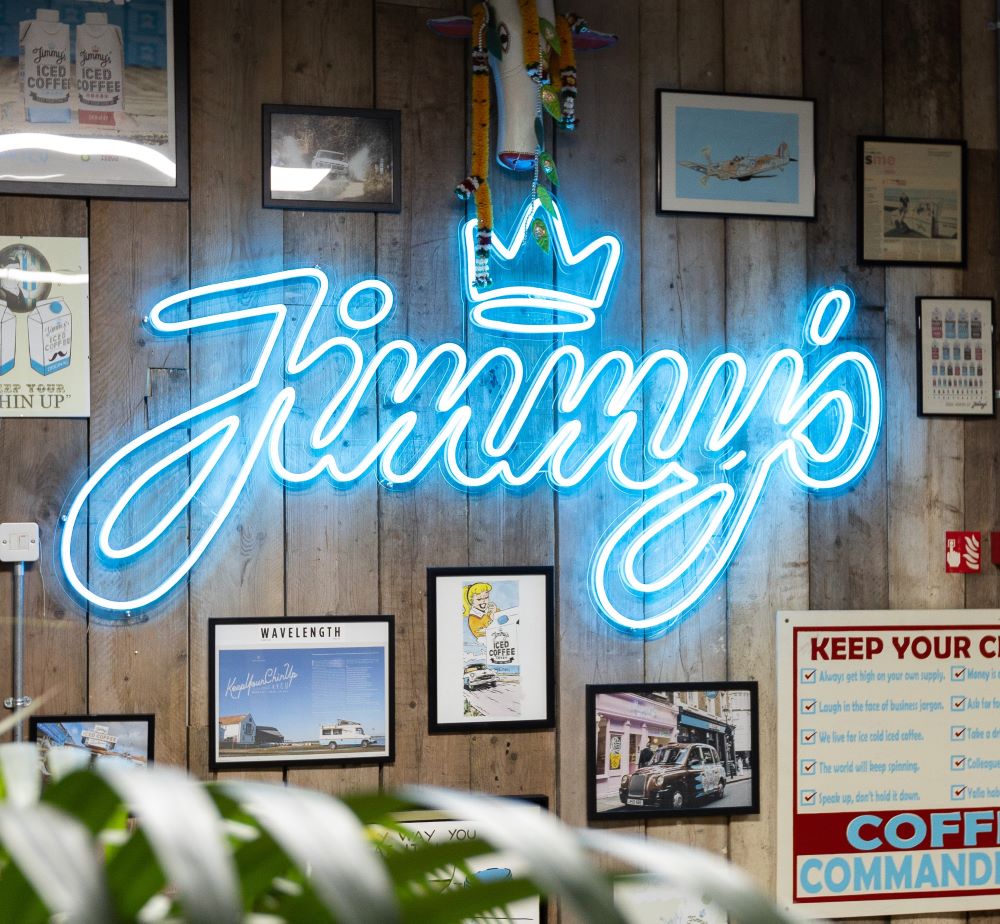 Custom Neon® logo in tropical blue @jimmysicedcoffee