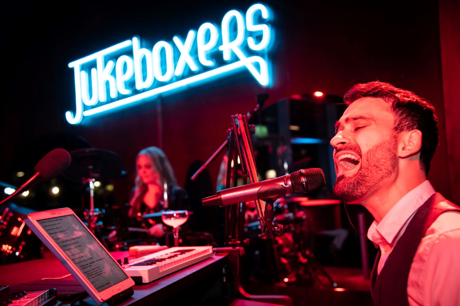 Blue Custom Neon® logo @jukeboxersbar