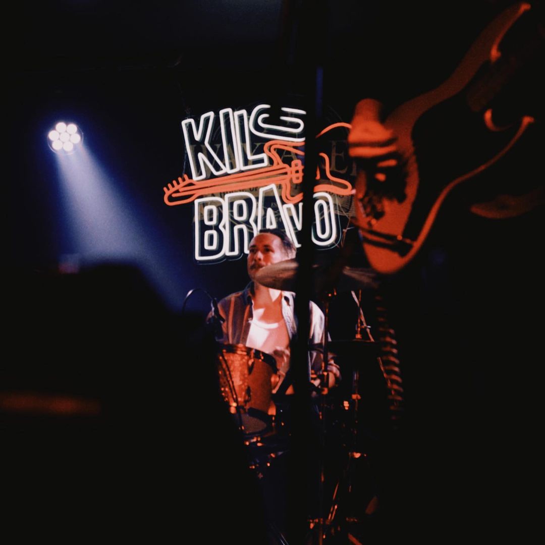 Custom Neon® red & white band logo @kilobravomusic