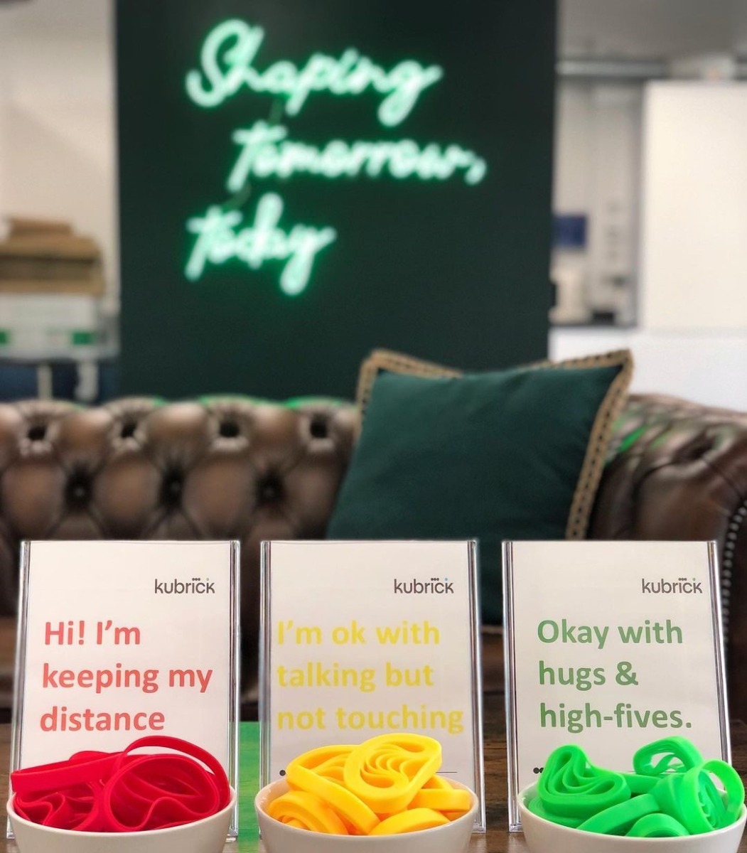 Green company slogan sign by Custom Neon® for @kubrickgroup