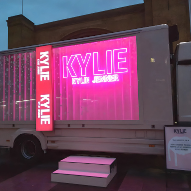 Custom Neon® all weather sign on the side of the Kylie Jenner cosmetics product launch van @kyliecosmetics