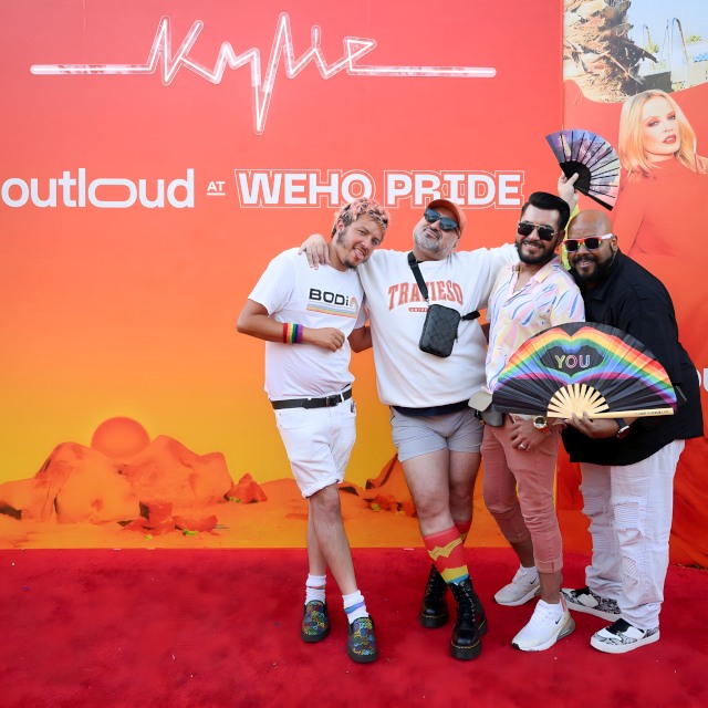 Blue @kaninesocial branded Custom Neon® photo wall sign at Christmas