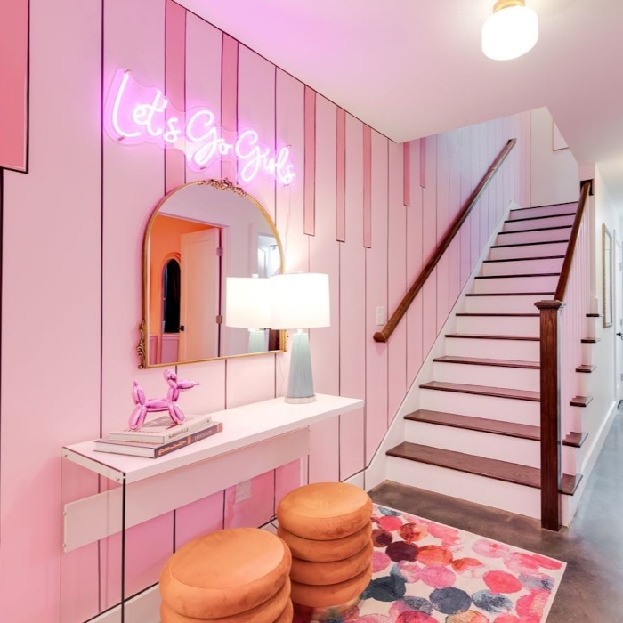 Lets Go Girls baby pink Custom Neon® sign on pink piano keys wallpaper in a short term rental home designed @somerleddesigns managed by hometeamluxuryrentals.com