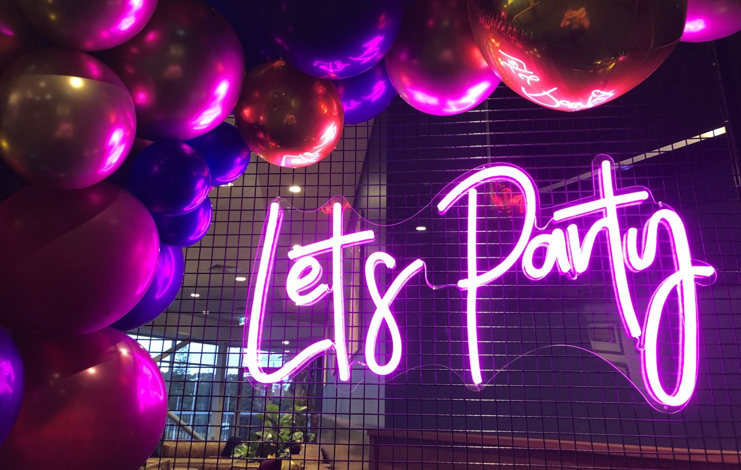 Let's Party dark pink Custom Neon® sign