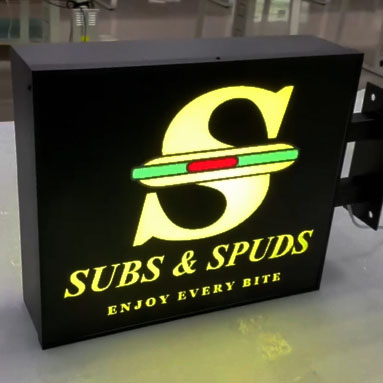 Subs and Spuds back and front lit light box