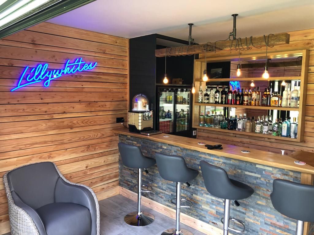 Custom Neon® blue family name bar sign