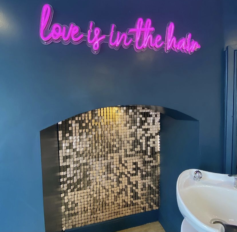 Pink LED neon quote Love is in the Hair @blushsalon.uk made by Custom Neon®