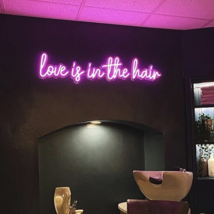 Pink Custom Neon® song lyric sign in hair salon @blushsalon.uk