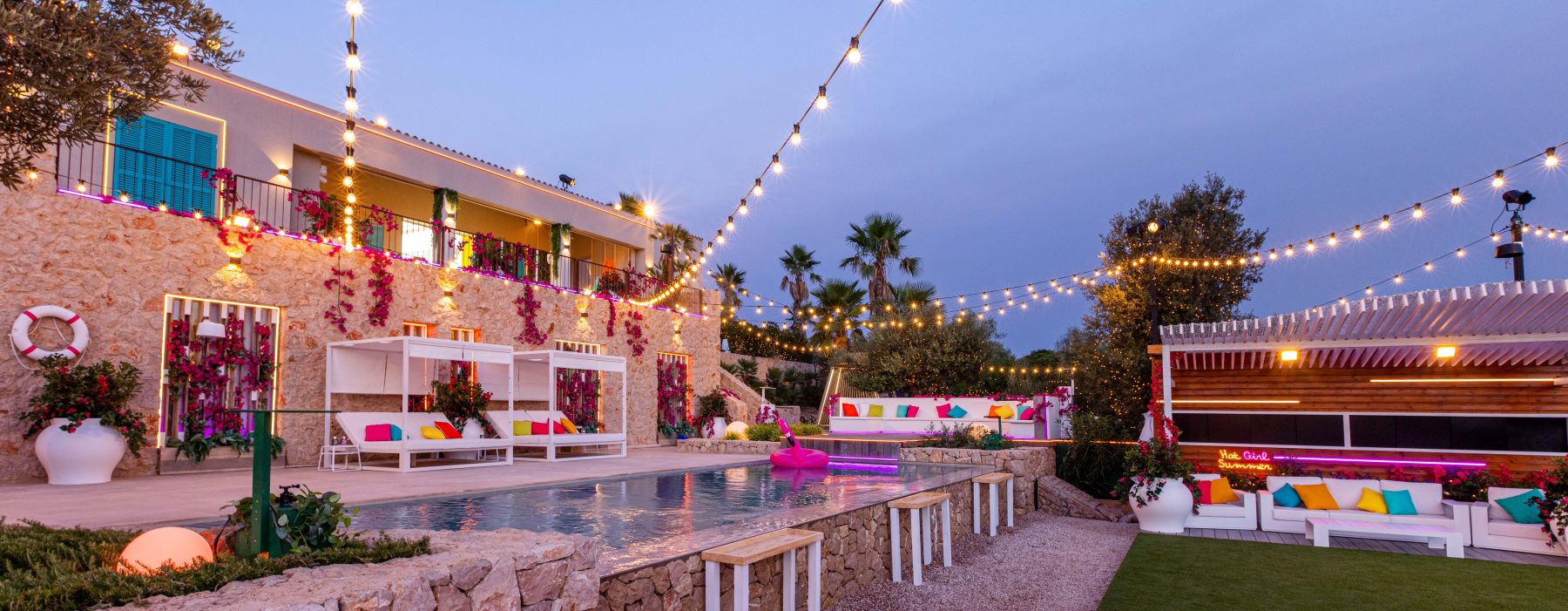 Love Island Australia Villa backyard pool area featuring Custom Neon® signs