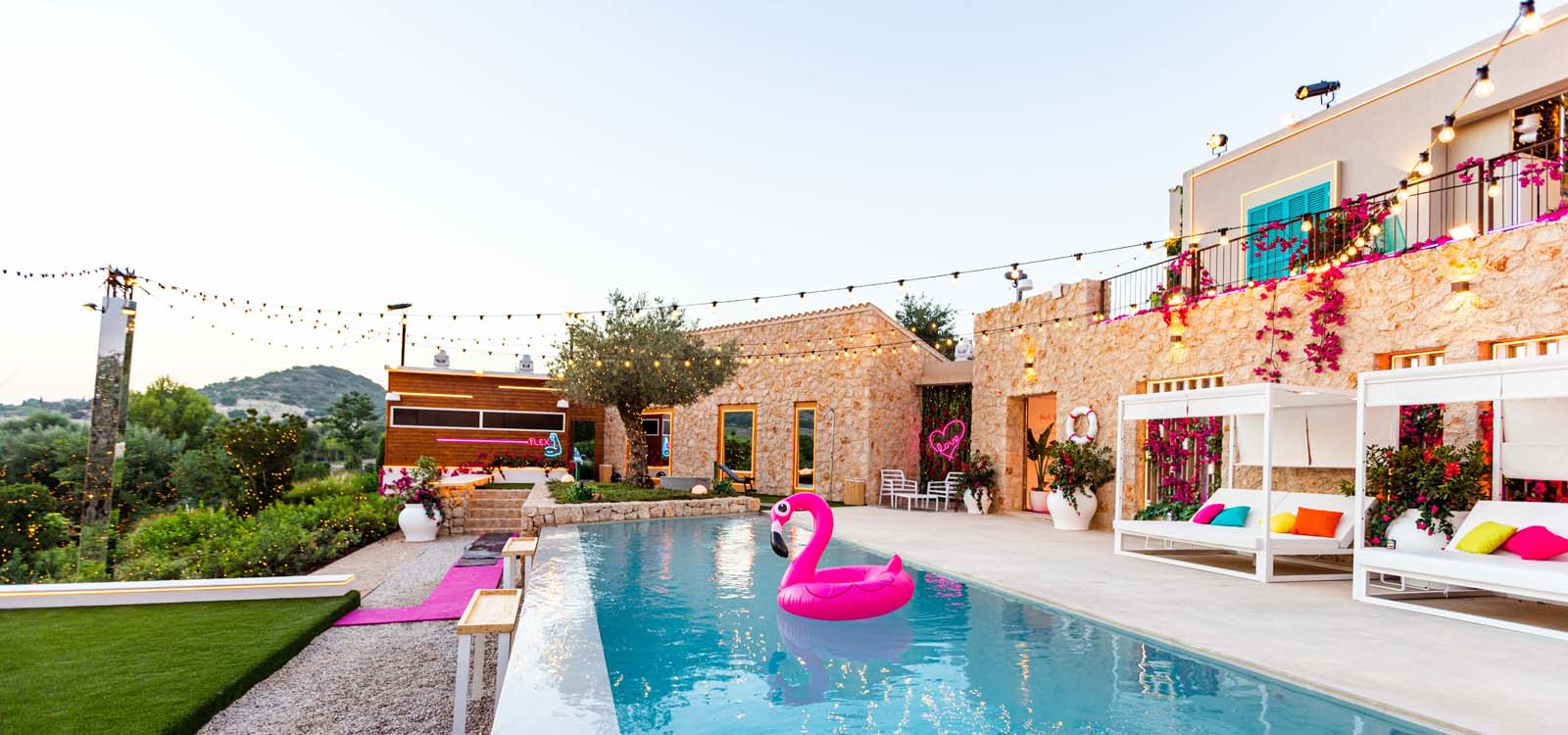 Love Island Australia Season 4 Villa pool featuring Custom Neon® signs