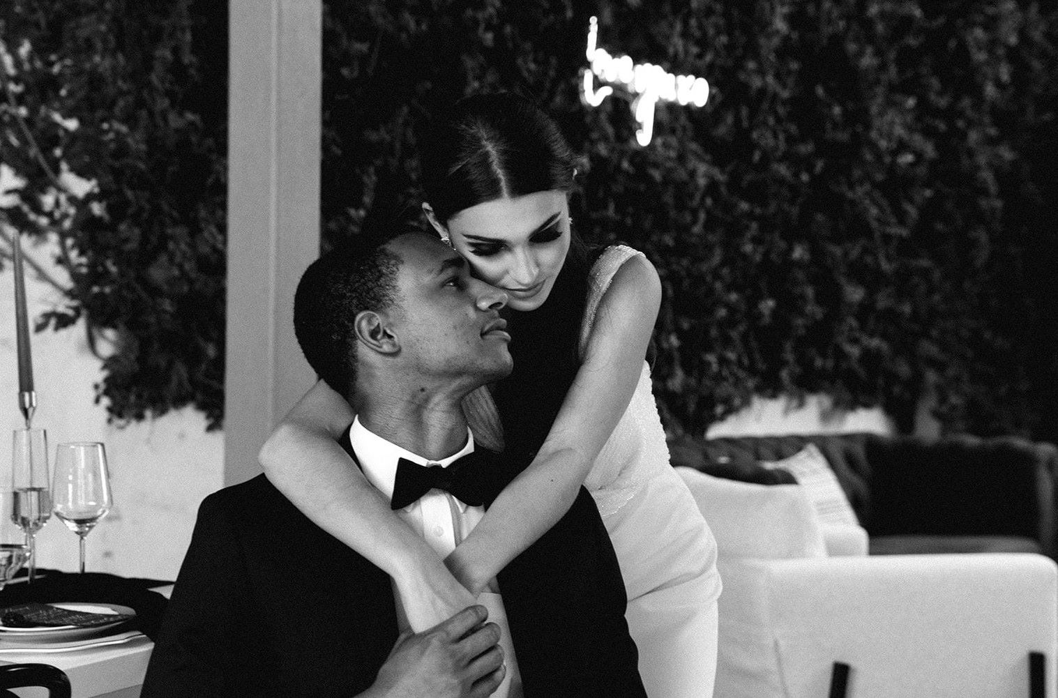 Custom Neon® Love You XO sign photographed in black and white by @candileonardphotography