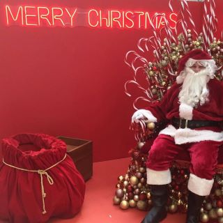 Custom Neon® red Merry Christmas light sign as part of Santas Grotto at @rhodeswaterside shopping mall