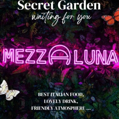 Custom Neon® pink restaurant name sign in the secret garden @mezzalunabristol
