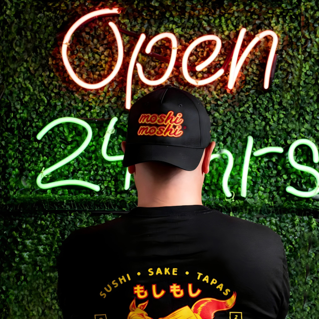 Open 24 Hours Custom Neon® sign on greenwall @moshimoshi