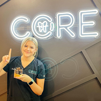 White Custom Neon® logo for @coreothodontics